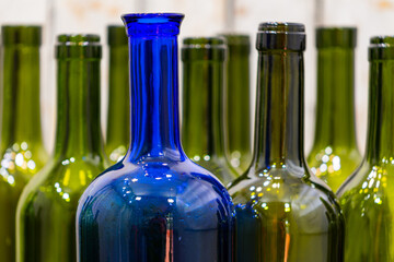 
Empty foreground bottles of colors and alcohol for decoration
