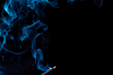 Obraz premium random shapes of colored smoke fired with colored flash