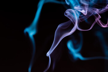 Fototapeta premium random shapes of colored smoke fired with colored flash