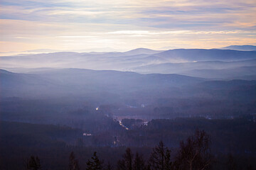 beautiful view from the mountains.  mountain valley.  relief landscape.  hilly area against the sky.