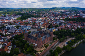 Fototapeta na wymiar Aeriel view of the city Aschaffenburg in Germany on a cloudy noon in spring. 