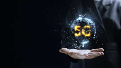 Human hand holding earth 5G globe holographic technology . Futuristic visualization for virtual reality and augmented reality . Empty space for your text.