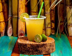 Sugarcane juice, guarapo de caña - obrazy, fototapety, plakaty