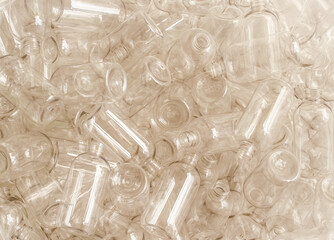 Set of many clean plastic bottles in trendy set sail champagne color. Transparent background.