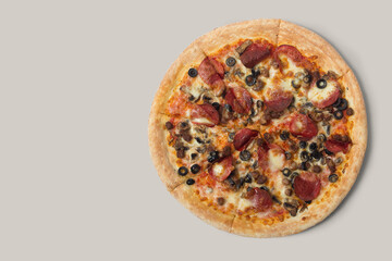 The pizzas are delicious and the ingredients are sausage, bacon and mozzarella on a brown background. can be made of backgrounds, flyers and other forms of advertising,