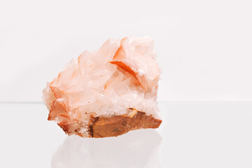 Protection crystal on light. Natural mineral rock specimen, big beautiful stone quartz.