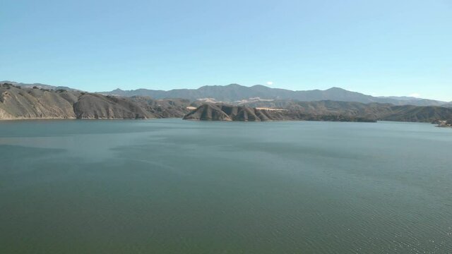 Aerial Morning View of Lake Cachuma and Shoreline Santa Barbara, California. Zoom In,Forward and Rising Drone Shot.