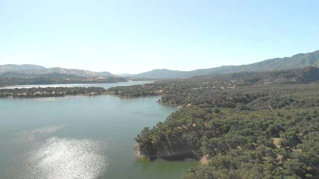 Aerial Morning View of Lake Cachuma and Shoreline Santa Barbara, California. Rising Drone Shot.