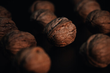 walnuts on a black background