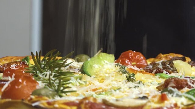 Making pizza by hand, from dough cheese and delicious products