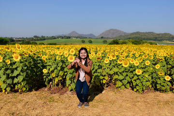 girl in a field of sunflowers