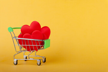 hearts in shopping grocery cart, shopping handcart