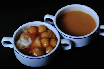 This is Jenang Grendul. Traditional Indonesian food made from rice flour and brown sugar sauce