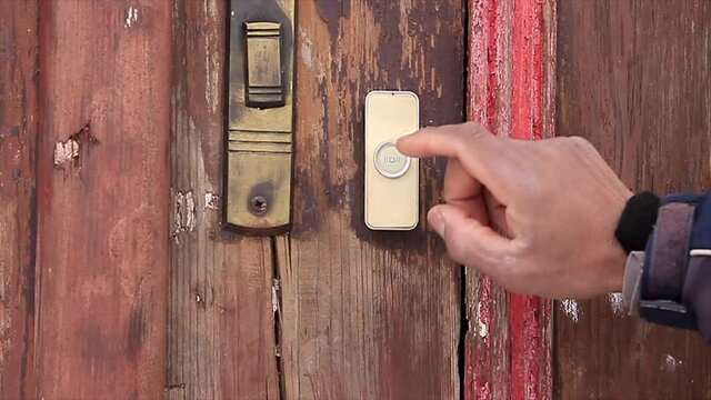 delivery man pressing doorbell with a delivery stock footage stock video