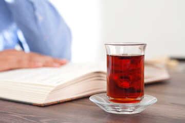 A cup of black tea and serious readers