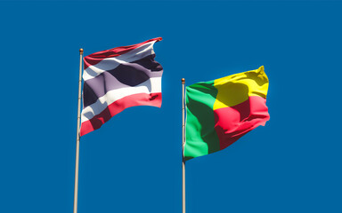 Flags of Thailand and Benin.