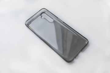 Transparent silicone smartphone case, close-up on white background