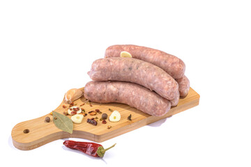 Raw pork sausages.Grilled sausages in close-up, isolated on a white background.Selective focus.