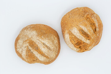 Rye bread on a white plate.