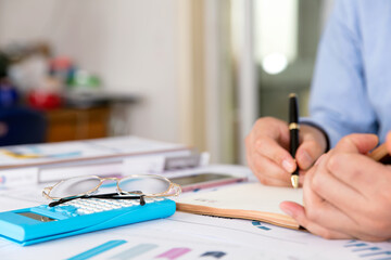 An accountant or businessman at work