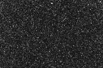 Falling realistic natural snowflakes on a black backgraund.