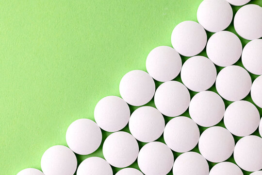 Image of a drug, pill, or treatment. At the green surface layer.