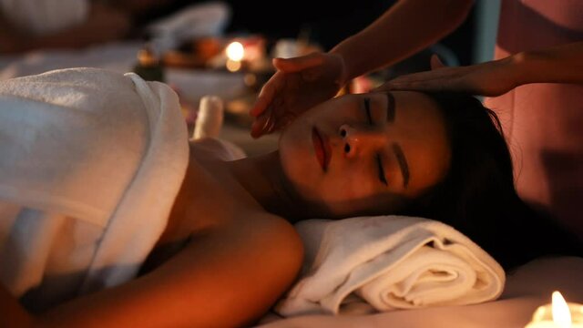 Asian woman enjoy spa body massage at spa room