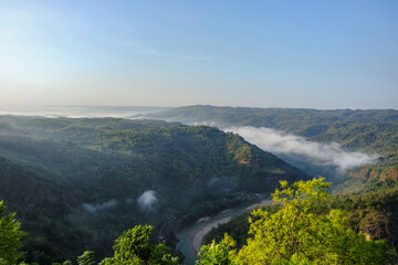 Beautiful morning landscape with mountains and river at Jurang Tembelan (kebun buah mangunan)...