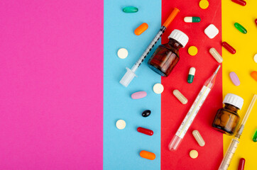 Disease and treatment. Medicine concept. Medication and packaging on bright background. Studio Photo