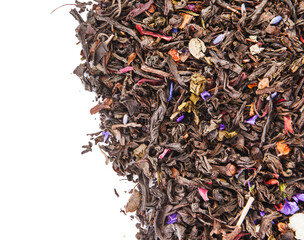 Dry tea leaves on white background