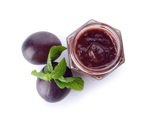 Glass jar with delicious homemade plum jam on white background