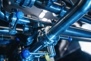 Obraz premium Industrial automation factory food equipment pipe stainless tubes