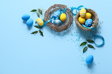 Composition with beautiful Easter eggs on color background