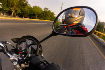 Rider driving in the mirror