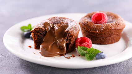 Fototapeta na wymiar chocolate cake fondant and berries fruits
