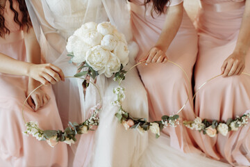 wedding details. the bride's bouquet. peonies.wedding gatherings of the bride.wedding rings with...