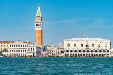 Fototapeta na wymiar View of Venice in a clear sunny day with the most iconic landmarks: St Mark's Basilica bell tower and Doge's Palace