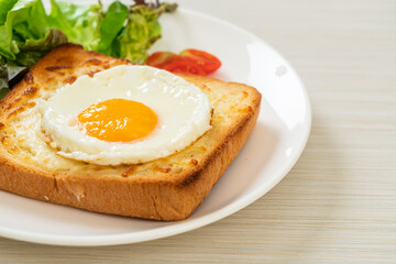 bread toasted with cheese and fried egg