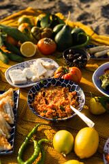 Beach picnic with bulgur pilav, white cheese and olives