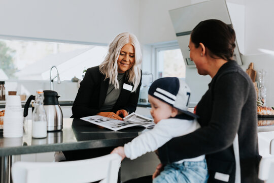 Estate agent showing woman house