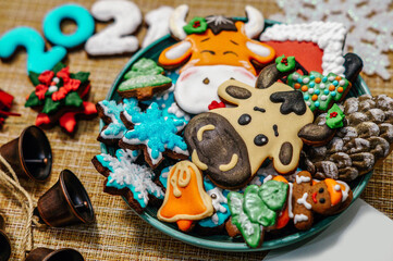 Gingerbread cow as symbol 2021. Christmas, Happy New Year 2021. New Year food bull