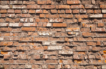 Old brick wall with old red bricks.