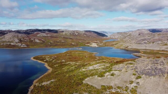 Cultural landscape of Aasivissuit Nipisat - UNESCO, World Heritage Site. Early autumn in the Arctic. Aerial panning right, tilting up.