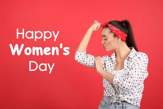 Strong woman as symbol of girl power on red background. Happy Women's Day