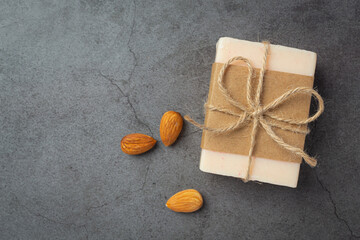 Handmade soap almond on dark background