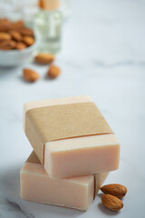 Handmade soap almond on marble background