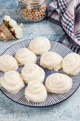 Home-made meringue with a decoction of Aquafaba chickpeas. Concept of an alternative to chicken eggs to vegetable proteins