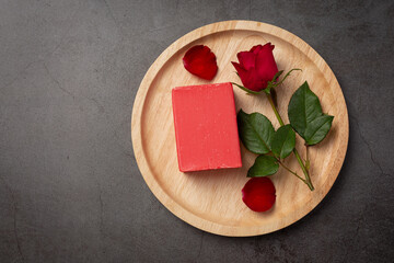 Rose handmade soap on dark background