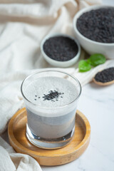 Soy milk mix black sesame on marble background