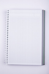 Checkered notebook on a white background